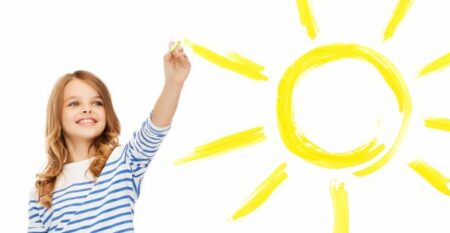 girl drawing big sun in the air